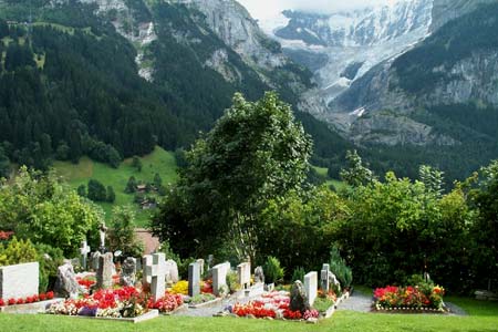 Beautiful Grindelwald cemetery surrounded by mountains