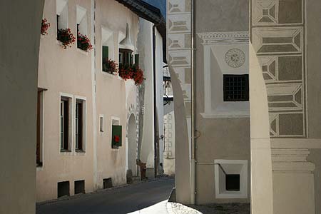 Bever - a narrow street and decorated walls